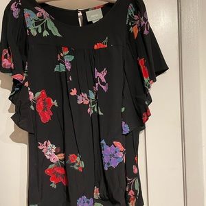 Maeve black floral blouse from Anthropologie